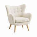 Fauteuil en tissu bouclé beige avec pieds en bois