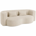 Canapé 3 places en tissu bouclé beige avec coussins